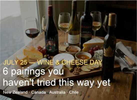 Six varieties of cheese on a wooden board, served with six different wine glasses and bottles from New Zealand, Canada, Australia, and Chile for Wine and Cheese Day
